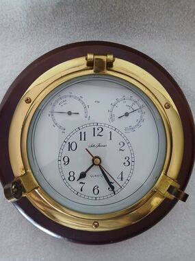 Seth Thomas Meridian Porthole Hand-polished Brass Wall Clock.